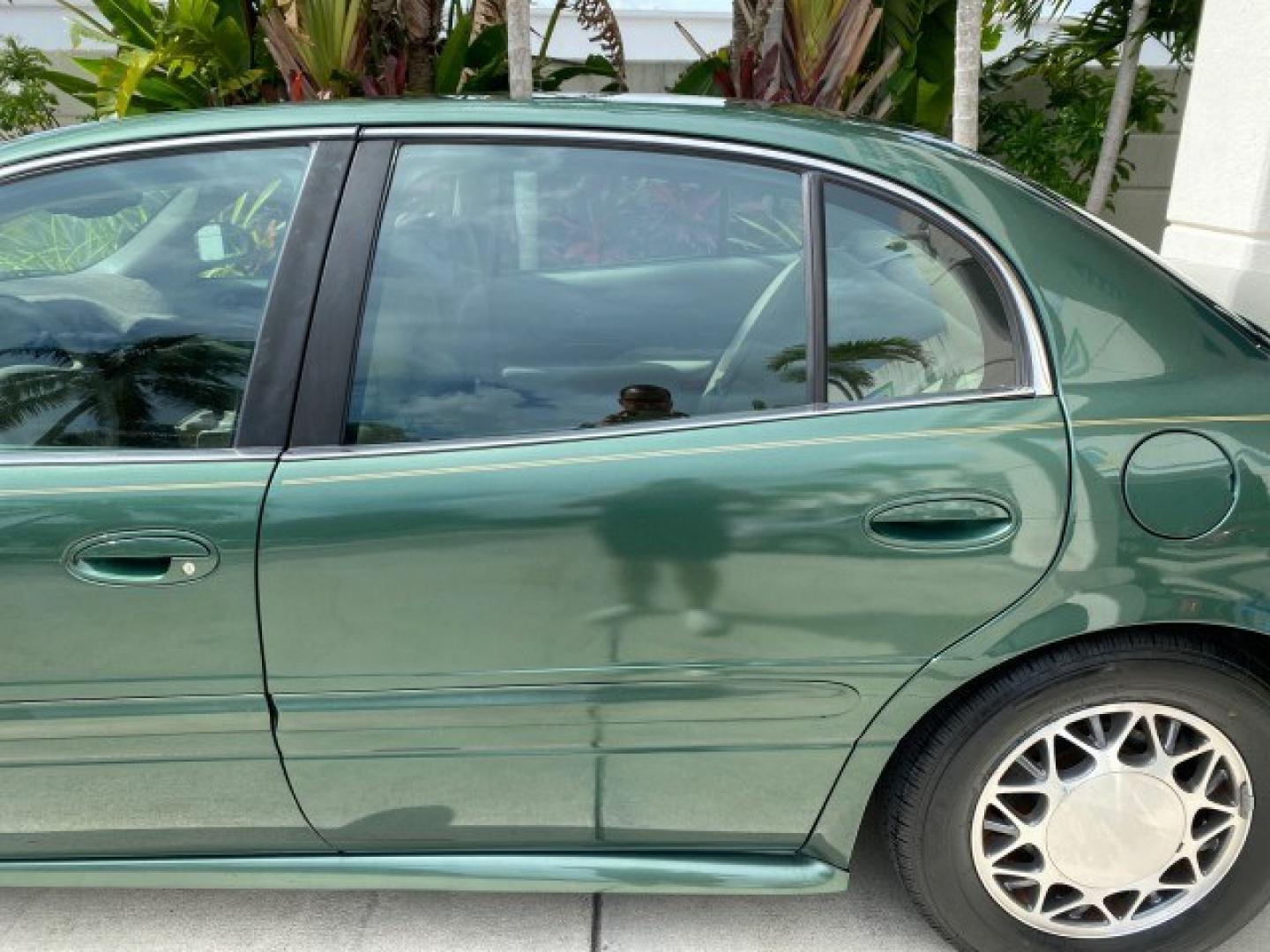 2003 Jade Green Metallic /Taupe Buick LeSabre Custom 1 OWNER LEATHER LOW MILES 89,057 (1G4HP52K13U) with an 3.8L 3800 V6 SFI Engine engine, Automatic transmission, located at 4701 North Dixie Hwy, Pompano Beach, FL, 33064, (954) 422-2889, 26.240938, -80.123474 - OUR WEBPAGE FLORIDACARS1.COM HAS OVER 100 PHOTOS AND FREE CARFAX LINK 2003 Buick Lesabre Custom 1 OWNER Sedan 4 DR 3.8L V6 F 12V Gasoline 29 MPG Front Wheel Drive Features ABS Brakes Air Conditioning Alloy Wheels AM/FM Stereo Automatic Transmission CD Audio Cruise Control Leather Seats Power Locks P- Photo#71