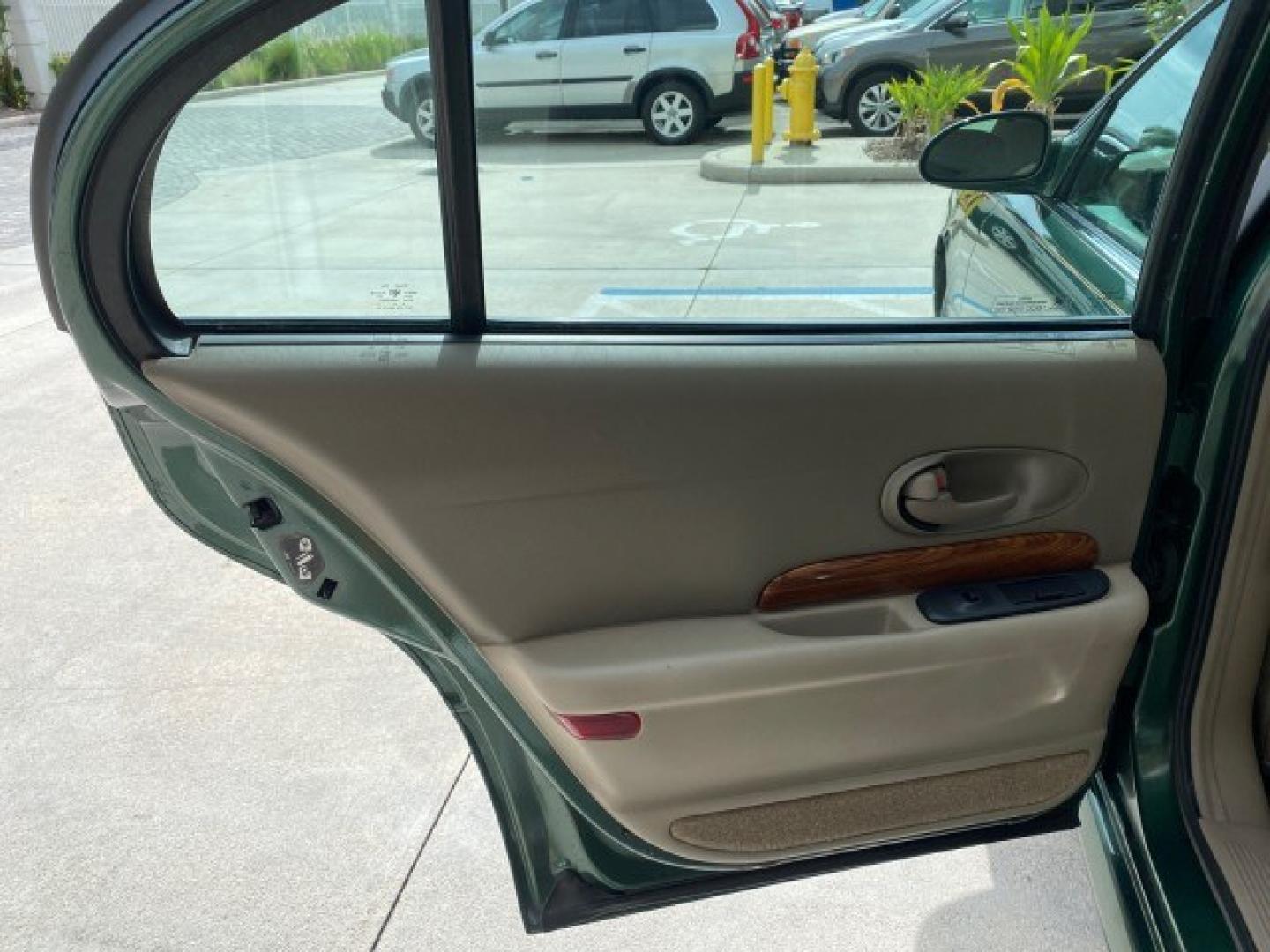 2003 Jade Green Metallic /Taupe Buick LeSabre Custom 1 OWNER LEATHER LOW MILES 89,057 (1G4HP52K13U) with an 3.8L 3800 V6 SFI Engine engine, Automatic transmission, located at 4701 North Dixie Hwy, Pompano Beach, FL, 33064, (954) 422-2889, 26.240938, -80.123474 - OUR WEBPAGE FLORIDACARS1.COM HAS OVER 100 PHOTOS AND FREE CARFAX LINK 2003 Buick Lesabre Custom 1 OWNER Sedan 4 DR 3.8L V6 F 12V Gasoline 29 MPG Front Wheel Drive Features ABS Brakes Air Conditioning Alloy Wheels AM/FM Stereo Automatic Transmission CD Audio Cruise Control Leather Seats Power Locks P- Photo#73