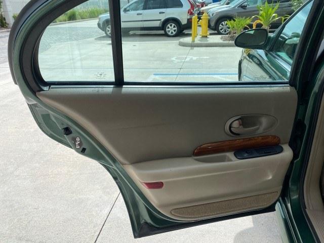 2003 Jade Green Metallic /Taupe Buick LeSabre Custom 1 OWNER LEATHER LOW MILES 89,057 (1G4HP52K13U) with an 3.8L 3800 V6 SFI Engine engine, Automatic transmission, located at 4701 North Dixie Hwy, Pompano Beach, FL, 33064, (954) 422-2889, 26.240938, -80.123474 - OUR WEBPAGE FLORIDACARS1.COM HAS OVER 100 PHOTOS AND FREE CARFAX LINK 2003 Buick Lesabre Custom 1 OWNER Sedan 4 DR 3.8L V6 F 12V Gasoline 29 MPG Front Wheel Drive Features ABS Brakes Air Conditioning Alloy Wheels AM/FM Stereo Automatic Transmission CD Audio Cruise Control Leather Seats Power Locks P- Photo#73