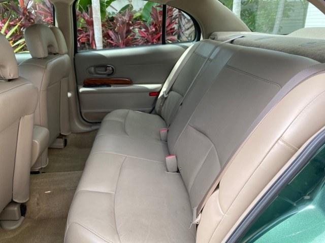 2003 Jade Green Metallic /Taupe Buick LeSabre Custom 1 OWNER LEATHER LOW MILES 89,057 (1G4HP52K13U) with an 3.8L 3800 V6 SFI Engine engine, Automatic transmission, located at 4701 North Dixie Hwy, Pompano Beach, FL, 33064, (954) 422-2889, 26.240938, -80.123474 - OUR WEBPAGE FLORIDACARS1.COM HAS OVER 100 PHOTOS AND FREE CARFAX LINK 2003 Buick Lesabre Custom 1 OWNER Sedan 4 DR 3.8L V6 F 12V Gasoline 29 MPG Front Wheel Drive Features ABS Brakes Air Conditioning Alloy Wheels AM/FM Stereo Automatic Transmission CD Audio Cruise Control Leather Seats Power Locks P- Photo#74