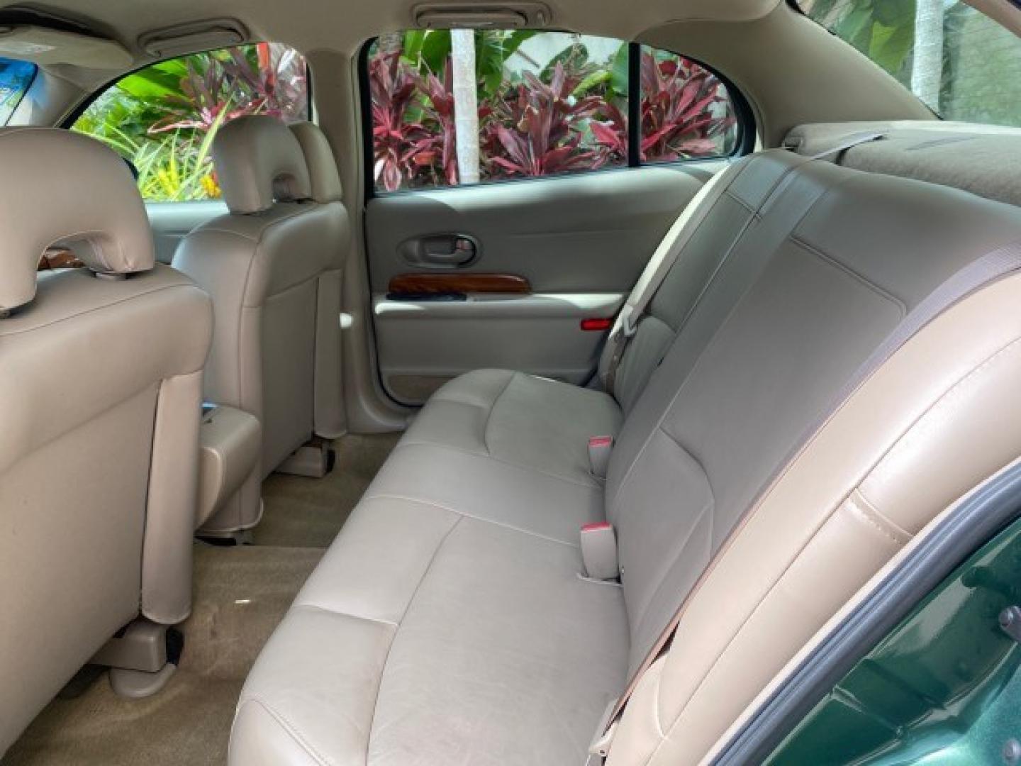 2003 Jade Green Metallic /Taupe Buick LeSabre Custom 1 OWNER LEATHER LOW MILES 89,057 (1G4HP52K13U) with an 3.8L 3800 V6 SFI Engine engine, Automatic transmission, located at 4701 North Dixie Hwy, Pompano Beach, FL, 33064, (954) 422-2889, 26.240938, -80.123474 - OUR WEBPAGE FLORIDACARS1.COM HAS OVER 100 PHOTOS AND FREE CARFAX LINK 2003 Buick Lesabre Custom 1 OWNER Sedan 4 DR 3.8L V6 F 12V Gasoline 29 MPG Front Wheel Drive Features ABS Brakes Air Conditioning Alloy Wheels AM/FM Stereo Automatic Transmission CD Audio Cruise Control Leather Seats Power Locks P- Photo#76
