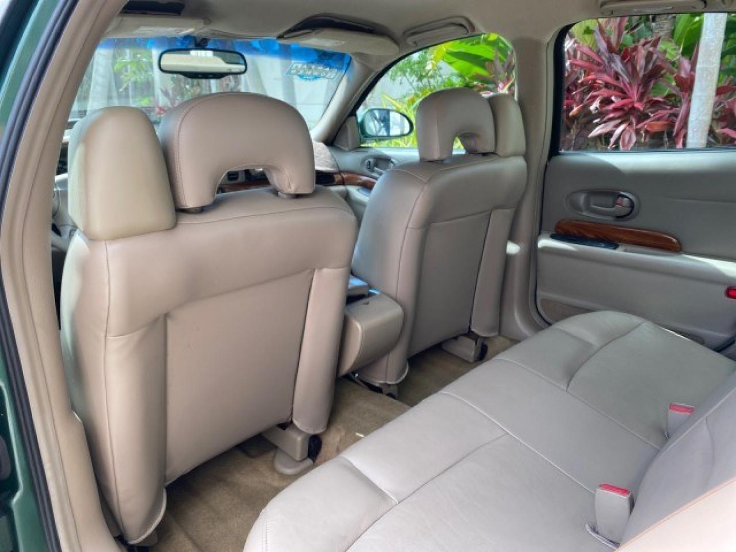 2003 Jade Green Metallic /Taupe Buick LeSabre Custom 1 OWNER LEATHER LOW MILES 89,057 (1G4HP52K13U) with an 3.8L 3800 V6 SFI Engine engine, Automatic transmission, located at 4701 North Dixie Hwy, Pompano Beach, FL, 33064, (954) 422-2889, 26.240938, -80.123474 - OUR WEBPAGE FLORIDACARS1.COM HAS OVER 100 PHOTOS AND FREE CARFAX LINK 2003 Buick Lesabre Custom 1 OWNER Sedan 4 DR 3.8L V6 F 12V Gasoline 29 MPG Front Wheel Drive Features ABS Brakes Air Conditioning Alloy Wheels AM/FM Stereo Automatic Transmission CD Audio Cruise Control Leather Seats Power Locks P- Photo#79