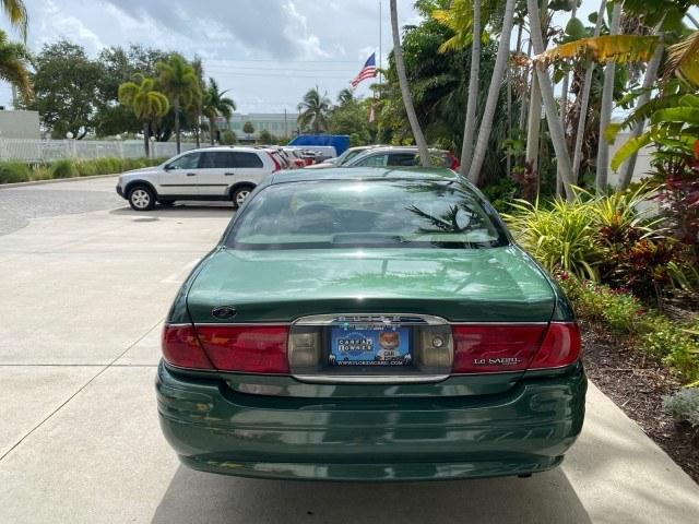 2003 Jade Green Metallic /Taupe Buick LeSabre Custom 1 OWNER LEATHER LOW MILES 89,057 (1G4HP52K13U) with an 3.8L 3800 V6 SFI Engine engine, Automatic transmission, located at 4701 North Dixie Hwy, Pompano Beach, FL, 33064, (954) 422-2889, 26.240938, -80.123474 - OUR WEBPAGE FLORIDACARS1.COM HAS OVER 100 PHOTOS AND FREE CARFAX LINK 2003 Buick Lesabre Custom 1 OWNER Sedan 4 DR 3.8L V6 F 12V Gasoline 29 MPG Front Wheel Drive Features ABS Brakes Air Conditioning Alloy Wheels AM/FM Stereo Automatic Transmission CD Audio Cruise Control Leather Seats Power Locks P- Photo#87
