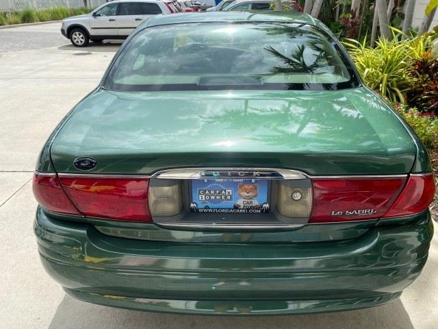 2003 Jade Green Metallic /Taupe Buick LeSabre Custom 1 OWNER LEATHER LOW MILES 89,057 (1G4HP52K13U) with an 3.8L 3800 V6 SFI Engine engine, Automatic transmission, located at 4701 North Dixie Hwy, Pompano Beach, FL, 33064, (954) 422-2889, 26.240938, -80.123474 - OUR WEBPAGE FLORIDACARS1.COM HAS OVER 100 PHOTOS AND FREE CARFAX LINK 2003 Buick Lesabre Custom 1 OWNER Sedan 4 DR 3.8L V6 F 12V Gasoline 29 MPG Front Wheel Drive Features ABS Brakes Air Conditioning Alloy Wheels AM/FM Stereo Automatic Transmission CD Audio Cruise Control Leather Seats Power Locks P- Photo#88