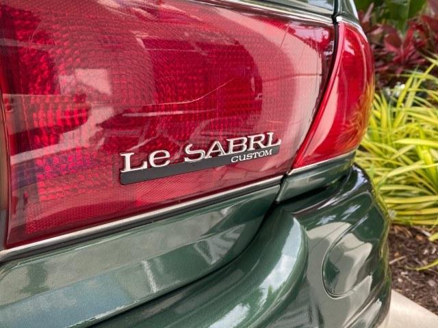 2003 Jade Green Metallic /Taupe Buick LeSabre Custom 1 OWNER LEATHER LOW MILES 89,057 (1G4HP52K13U) with an 3.8L 3800 V6 SFI Engine engine, Automatic transmission, located at 4701 North Dixie Hwy, Pompano Beach, FL, 33064, (954) 422-2889, 26.240938, -80.123474 - OUR WEBPAGE FLORIDACARS1.COM HAS OVER 100 PHOTOS AND FREE CARFAX LINK 2003 Buick Lesabre Custom 1 OWNER Sedan 4 DR 3.8L V6 F 12V Gasoline 29 MPG Front Wheel Drive Features ABS Brakes Air Conditioning Alloy Wheels AM/FM Stereo Automatic Transmission CD Audio Cruise Control Leather Seats Power Locks P- Photo#90