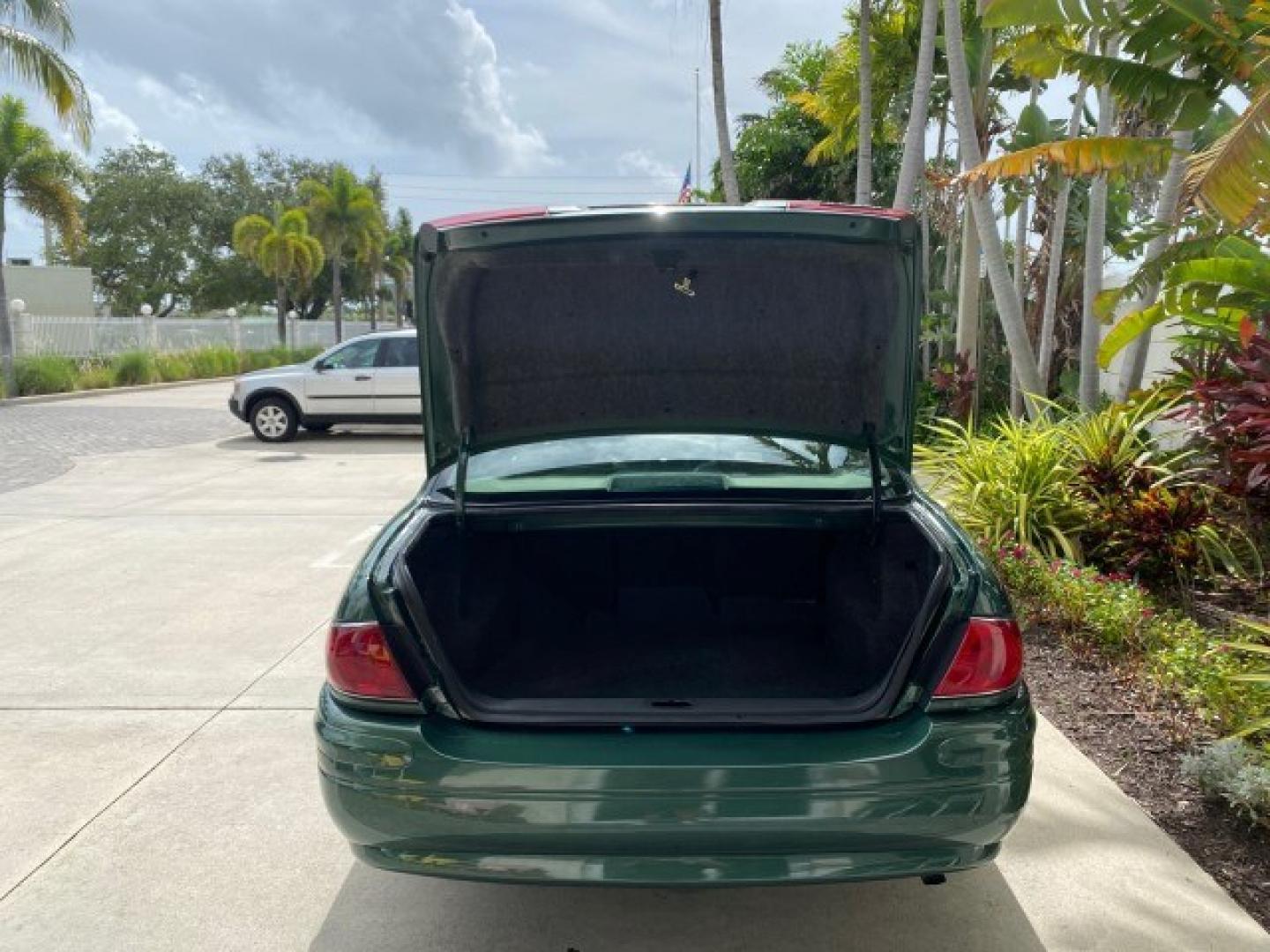 2003 Jade Green Metallic /Taupe Buick LeSabre Custom 1 OWNER LEATHER LOW MILES 89,057 (1G4HP52K13U) with an 3.8L 3800 V6 SFI Engine engine, Automatic transmission, located at 4701 North Dixie Hwy, Pompano Beach, FL, 33064, (954) 422-2889, 26.240938, -80.123474 - OUR WEBPAGE FLORIDACARS1.COM HAS OVER 100 PHOTOS AND FREE CARFAX LINK 2003 Buick Lesabre Custom 1 OWNER Sedan 4 DR 3.8L V6 F 12V Gasoline 29 MPG Front Wheel Drive Features ABS Brakes Air Conditioning Alloy Wheels AM/FM Stereo Automatic Transmission CD Audio Cruise Control Leather Seats Power Locks P- Photo#92