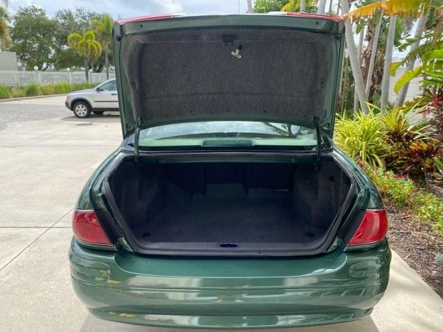 2003 Jade Green Metallic /Taupe Buick LeSabre Custom 1 OWNER LEATHER LOW MILES 89,057 (1G4HP52K13U) with an 3.8L 3800 V6 SFI Engine engine, Automatic transmission, located at 4701 North Dixie Hwy, Pompano Beach, FL, 33064, (954) 422-2889, 26.240938, -80.123474 - OUR WEBPAGE FLORIDACARS1.COM HAS OVER 100 PHOTOS AND FREE CARFAX LINK 2003 Buick Lesabre Custom 1 OWNER Sedan 4 DR 3.8L V6 F 12V Gasoline 29 MPG Front Wheel Drive Features ABS Brakes Air Conditioning Alloy Wheels AM/FM Stereo Automatic Transmission CD Audio Cruise Control Leather Seats Power Locks P- Photo#93