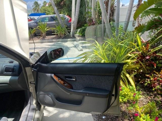 2002 Titanium Pearl /Dark Gray Subaru Legacy Wagon SW AUTO GT LOW MILES 61,766 (4S3BH645527) with an 2.5L SOHC SMPI 16-Valve 4-Cyl HO Boxer Engine engine, Automatic transmission, located at 4701 North Dixie Hwy, Pompano Beach, FL, 33064, (954) 422-2889, 26.240938, -80.123474 - OUR WEBPAGE FLORIDACARS1.COM HAS OVER 100 PHOTOS AND FREE CARFAX LINK 2002 Subaru Legacy GT Wagon 4 DR 2.5L H4 F SOHC 16V Gasoline 28 MPG All Wheel Drive Features 4WD/AWD ABS Brakes Air Conditioning Alloy Wheels AM/FM Stereo Automatic Transmission Cassette Player CD Audio Cloth Seats Cruise Control- Photo#11