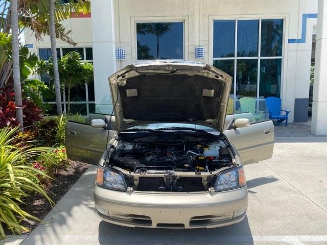 2002 Titanium Pearl /Dark Gray Subaru Legacy Wagon SW AUTO GT LOW MILES 61,766 (4S3BH645527) with an 2.5L SOHC SMPI 16-Valve 4-Cyl HO Boxer Engine engine, Automatic transmission, located at 4701 North Dixie Hwy, Pompano Beach, FL, 33064, (954) 422-2889, 26.240938, -80.123474 - OUR WEBPAGE FLORIDACARS1.COM HAS OVER 100 PHOTOS AND FREE CARFAX LINK 2002 Subaru Legacy GT Wagon 4 DR 2.5L H4 F SOHC 16V Gasoline 28 MPG All Wheel Drive Features 4WD/AWD ABS Brakes Air Conditioning Alloy Wheels AM/FM Stereo Automatic Transmission Cassette Player CD Audio Cloth Seats Cruise Control- Photo#16