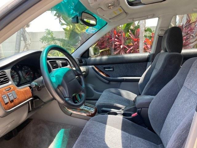2002 Titanium Pearl /Dark Gray Subaru Legacy Wagon SW AUTO GT LOW MILES 61,766 (4S3BH645527) with an 2.5L SOHC SMPI 16-Valve 4-Cyl HO Boxer Engine engine, Automatic transmission, located at 4701 North Dixie Hwy, Pompano Beach, FL, 33064, (954) 422-2889, 26.240938, -80.123474 - OUR WEBPAGE FLORIDACARS1.COM HAS OVER 100 PHOTOS AND FREE CARFAX LINK 2002 Subaru Legacy GT Wagon 4 DR 2.5L H4 F SOHC 16V Gasoline 28 MPG All Wheel Drive Features 4WD/AWD ABS Brakes Air Conditioning Alloy Wheels AM/FM Stereo Automatic Transmission Cassette Player CD Audio Cloth Seats Cruise Control- Photo#45