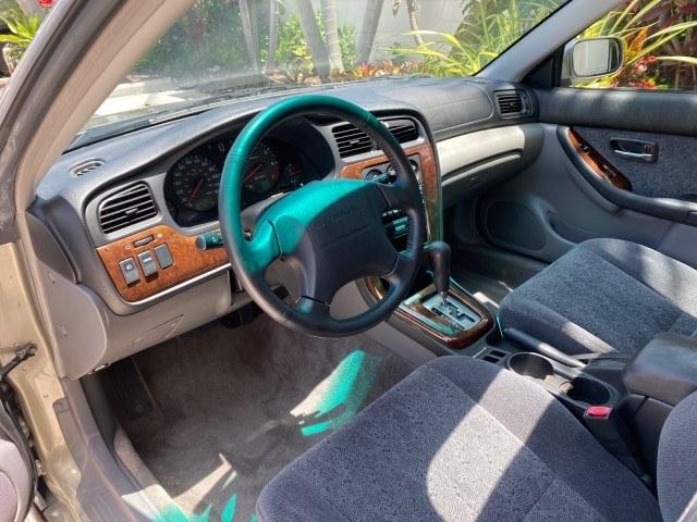 2002 Titanium Pearl /Dark Gray Subaru Legacy Wagon SW AUTO GT LOW MILES 61,766 (4S3BH645527) with an 2.5L SOHC SMPI 16-Valve 4-Cyl HO Boxer Engine engine, Automatic transmission, located at 4701 North Dixie Hwy, Pompano Beach, FL, 33064, (954) 422-2889, 26.240938, -80.123474 - OUR WEBPAGE FLORIDACARS1.COM HAS OVER 100 PHOTOS AND FREE CARFAX LINK 2002 Subaru Legacy GT Wagon 4 DR 2.5L H4 F SOHC 16V Gasoline 28 MPG All Wheel Drive Features 4WD/AWD ABS Brakes Air Conditioning Alloy Wheels AM/FM Stereo Automatic Transmission Cassette Player CD Audio Cloth Seats Cruise Control- Photo#48