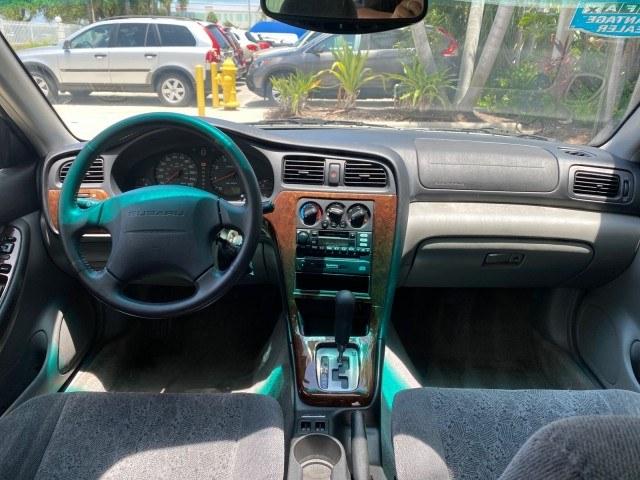 2002 Titanium Pearl /Dark Gray Subaru Legacy Wagon SW AUTO GT LOW MILES 61,766 (4S3BH645527) with an 2.5L SOHC SMPI 16-Valve 4-Cyl HO Boxer Engine engine, Automatic transmission, located at 4701 North Dixie Hwy, Pompano Beach, FL, 33064, (954) 422-2889, 26.240938, -80.123474 - OUR WEBPAGE FLORIDACARS1.COM HAS OVER 100 PHOTOS AND FREE CARFAX LINK 2002 Subaru Legacy GT Wagon 4 DR 2.5L H4 F SOHC 16V Gasoline 28 MPG All Wheel Drive Features 4WD/AWD ABS Brakes Air Conditioning Alloy Wheels AM/FM Stereo Automatic Transmission Cassette Player CD Audio Cloth Seats Cruise Control- Photo#85