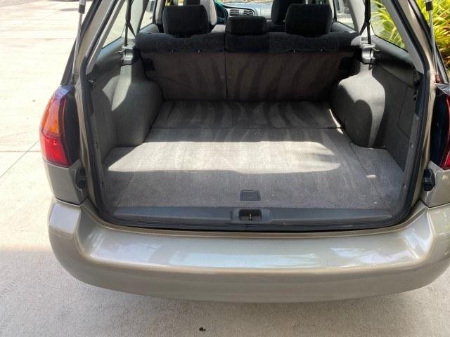 2002 Titanium Pearl /Dark Gray Subaru Legacy Wagon SW AUTO GT LOW MILES 61,766 (4S3BH645527) with an 2.5L SOHC SMPI 16-Valve 4-Cyl HO Boxer Engine engine, Automatic transmission, located at 4701 North Dixie Hwy, Pompano Beach, FL, 33064, (954) 422-2889, 26.240938, -80.123474 - OUR WEBPAGE FLORIDACARS1.COM HAS OVER 100 PHOTOS AND FREE CARFAX LINK 2002 Subaru Legacy GT Wagon 4 DR 2.5L H4 F SOHC 16V Gasoline 28 MPG All Wheel Drive Features 4WD/AWD ABS Brakes Air Conditioning Alloy Wheels AM/FM Stereo Automatic Transmission Cassette Player CD Audio Cloth Seats Cruise Control- Photo#97