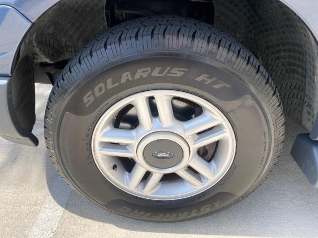 2003 True Blue Metallic /Flint Grey Ford Expedition LEATHER XLT LOW MILES 55,801 1 OWNER (1FMRU15L03L) with an 5.4L SOHC SEFI V8 Triton Engine engine, Automatic transmission, located at 4701 North Dixie Hwy, Pompano Beach, FL, 33064, (954) 422-2889, 26.240938, -80.123474 - OUR WEBPAGE FLORIDACARS1.COM HAS OVER 100 PHOTOS AND FREE CARFAX LINK 2003 Ford Expedition XLT 1 OWNER 4 Door Wagon/Sport Utility 5.4L V8 F SOHC 16V Gasoline 21 MPG Rear Wheel Drive Features ABS Brakes Air Conditioning Alloy Wheels AM/FM Stereo Automatic Transmission Cassette Player CD Audio Cruise- Photo#19