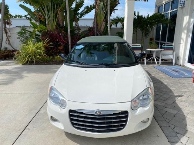 2004 Stone White /Dark Slate Gray Chrysler Sebring Limited LOW MILES 65,491 (1C3EL65R14N) with an 2.7L MPI DOHC 24-Valve V6 Engine engine, Automatic transmission, located at 4701 North Dixie Hwy, Pompano Beach, FL, 33064, (954) 422-2889, 26.240938, -80.123474 - OUR WEBPAGE FLORIDACARS1.COM HAS OVER 100 PHOTOS AND FREE CARFAX LINK 2004 Chrysler Sebring Limited Convertible 2.7L V6 F DOHC Gasoline 28 MPG Front Wheel Drive Features ABS Brakes Air Conditioning Alloy Wheels AM/FM Stereo Automatic Transmission CD Audio Cruise Control Infinity Sound System Leather- Photo#2