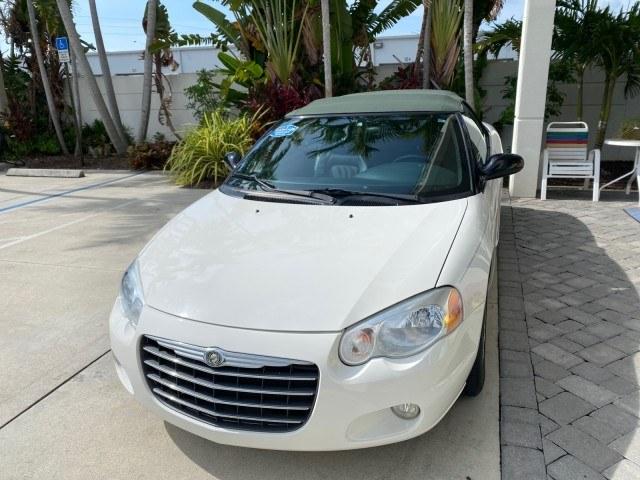 2004 Stone White /Dark Slate Gray Chrysler Sebring Limited LOW MILES 65,491 (1C3EL65R14N) with an 2.7L MPI DOHC 24-Valve V6 Engine engine, Automatic transmission, located at 4701 North Dixie Hwy, Pompano Beach, FL, 33064, (954) 422-2889, 26.240938, -80.123474 - OUR WEBPAGE FLORIDACARS1.COM HAS OVER 100 PHOTOS AND FREE CARFAX LINK 2004 Chrysler Sebring Limited Convertible 2.7L V6 F DOHC Gasoline 28 MPG Front Wheel Drive Features ABS Brakes Air Conditioning Alloy Wheels AM/FM Stereo Automatic Transmission CD Audio Cruise Control Infinity Sound System Leather- Photo#3