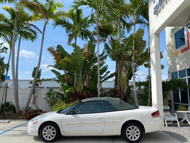 2004 Stone White /Dark Slate Gray Chrysler Sebring Limited LOW MILES 65,491 (1C3EL65R14N) with an 2.7L MPI DOHC 24-Valve V6 Engine engine, Automatic transmission, located at 4701 North Dixie Hwy, Pompano Beach, FL, 33064, (954) 422-2889, 26.240938, -80.123474 - OUR WEBPAGE FLORIDACARS1.COM HAS OVER 100 PHOTOS AND FREE CARFAX LINK 2004 Chrysler Sebring Limited Convertible 2.7L V6 F DOHC Gasoline 28 MPG Front Wheel Drive Features ABS Brakes Air Conditioning Alloy Wheels AM/FM Stereo Automatic Transmission CD Audio Cruise Control Infinity Sound System Leather- Photo#4