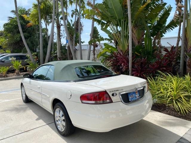 2004 Stone White /Dark Slate Gray Chrysler Sebring Limited LOW MILES 65,491 (1C3EL65R14N) with an 2.7L MPI DOHC 24-Valve V6 Engine engine, Automatic transmission, located at 4701 North Dixie Hwy, Pompano Beach, FL, 33064, (954) 422-2889, 26.240938, -80.123474 - OUR WEBPAGE FLORIDACARS1.COM HAS OVER 100 PHOTOS AND FREE CARFAX LINK 2004 Chrysler Sebring Limited Convertible 2.7L V6 F DOHC Gasoline 28 MPG Front Wheel Drive Features ABS Brakes Air Conditioning Alloy Wheels AM/FM Stereo Automatic Transmission CD Audio Cruise Control Infinity Sound System Leather- Photo#5