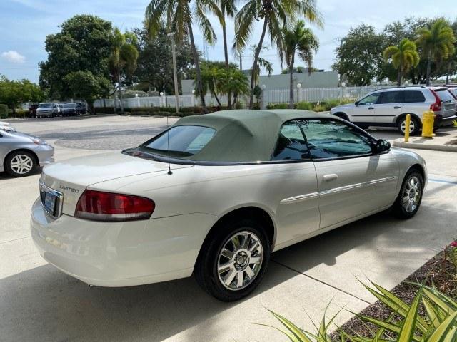 2004 Stone White /Dark Slate Gray Chrysler Sebring Limited LOW MILES 65,491 (1C3EL65R14N) with an 2.7L MPI DOHC 24-Valve V6 Engine engine, Automatic transmission, located at 4701 North Dixie Hwy, Pompano Beach, FL, 33064, (954) 422-2889, 26.240938, -80.123474 - OUR WEBPAGE FLORIDACARS1.COM HAS OVER 100 PHOTOS AND FREE CARFAX LINK 2004 Chrysler Sebring Limited Convertible 2.7L V6 F DOHC Gasoline 28 MPG Front Wheel Drive Features ABS Brakes Air Conditioning Alloy Wheels AM/FM Stereo Automatic Transmission CD Audio Cruise Control Infinity Sound System Leather- Photo#7