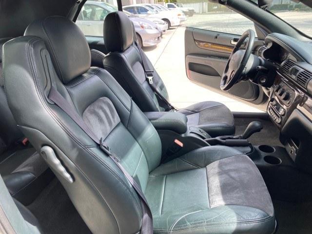 2004 Stone White /Dark Slate Gray Chrysler Sebring Limited LOW MILES 65,491 (1C3EL65R14N) with an 2.7L MPI DOHC 24-Valve V6 Engine engine, Automatic transmission, located at 4701 North Dixie Hwy, Pompano Beach, FL, 33064, (954) 422-2889, 26.240938, -80.123474 - OUR WEBPAGE FLORIDACARS1.COM HAS OVER 100 PHOTOS AND FREE CARFAX LINK 2004 Chrysler Sebring Limited Convertible 2.7L V6 F DOHC Gasoline 28 MPG Front Wheel Drive Features ABS Brakes Air Conditioning Alloy Wheels AM/FM Stereo Automatic Transmission CD Audio Cruise Control Infinity Sound System Leather- Photo#12