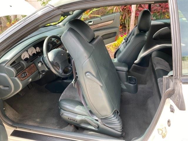 2004 Stone White /Dark Slate Gray Chrysler Sebring Limited LOW MILES 65,491 (1C3EL65R14N) with an 2.7L MPI DOHC 24-Valve V6 Engine engine, Automatic transmission, located at 4701 North Dixie Hwy, Pompano Beach, FL, 33064, (954) 422-2889, 26.240938, -80.123474 - OUR WEBPAGE FLORIDACARS1.COM HAS OVER 100 PHOTOS AND FREE CARFAX LINK 2004 Chrysler Sebring Limited Convertible 2.7L V6 F DOHC Gasoline 28 MPG Front Wheel Drive Features ABS Brakes Air Conditioning Alloy Wheels AM/FM Stereo Automatic Transmission CD Audio Cruise Control Infinity Sound System Leather- Photo#13
