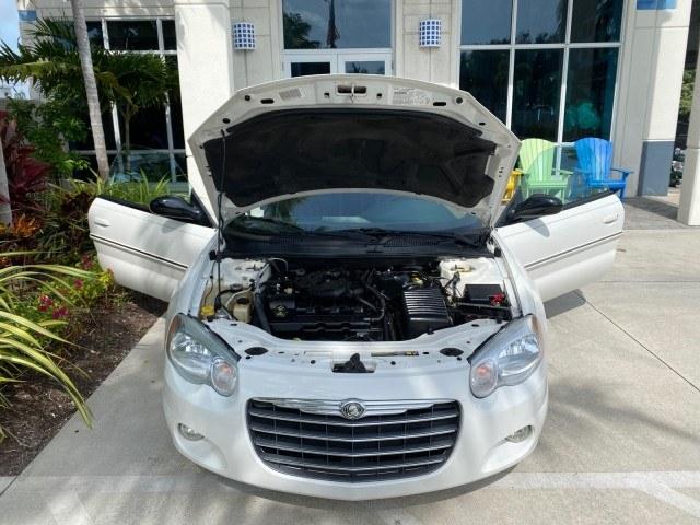 2004 Stone White /Dark Slate Gray Chrysler Sebring Limited LOW MILES 65,491 (1C3EL65R14N) with an 2.7L MPI DOHC 24-Valve V6 Engine engine, Automatic transmission, located at 4701 North Dixie Hwy, Pompano Beach, FL, 33064, (954) 422-2889, 26.240938, -80.123474 - OUR WEBPAGE FLORIDACARS1.COM HAS OVER 100 PHOTOS AND FREE CARFAX LINK 2004 Chrysler Sebring Limited Convertible 2.7L V6 F DOHC Gasoline 28 MPG Front Wheel Drive Features ABS Brakes Air Conditioning Alloy Wheels AM/FM Stereo Automatic Transmission CD Audio Cruise Control Infinity Sound System Leather- Photo#17