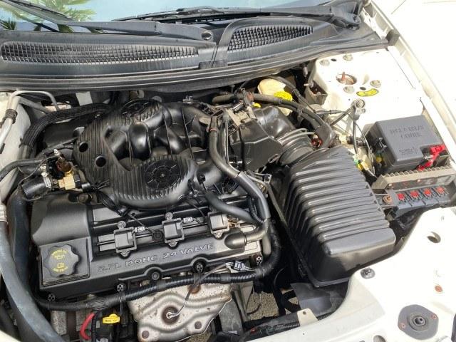 2004 Stone White /Dark Slate Gray Chrysler Sebring Limited LOW MILES 65,491 (1C3EL65R14N) with an 2.7L MPI DOHC 24-Valve V6 Engine engine, Automatic transmission, located at 4701 North Dixie Hwy, Pompano Beach, FL, 33064, (954) 422-2889, 26.240938, -80.123474 - OUR WEBPAGE FLORIDACARS1.COM HAS OVER 100 PHOTOS AND FREE CARFAX LINK 2004 Chrysler Sebring Limited Convertible 2.7L V6 F DOHC Gasoline 28 MPG Front Wheel Drive Features ABS Brakes Air Conditioning Alloy Wheels AM/FM Stereo Automatic Transmission CD Audio Cruise Control Infinity Sound System Leather- Photo#25