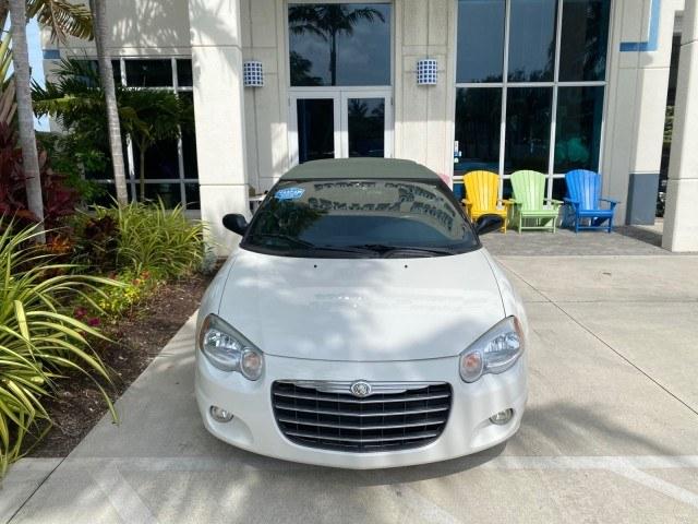 2004 Stone White /Dark Slate Gray Chrysler Sebring Limited LOW MILES 65,491 (1C3EL65R14N) with an 2.7L MPI DOHC 24-Valve V6 Engine engine, Automatic transmission, located at 4701 North Dixie Hwy, Pompano Beach, FL, 33064, (954) 422-2889, 26.240938, -80.123474 - OUR WEBPAGE FLORIDACARS1.COM HAS OVER 100 PHOTOS AND FREE CARFAX LINK 2004 Chrysler Sebring Limited Convertible 2.7L V6 F DOHC Gasoline 28 MPG Front Wheel Drive Features ABS Brakes Air Conditioning Alloy Wheels AM/FM Stereo Automatic Transmission CD Audio Cruise Control Infinity Sound System Leather- Photo#26