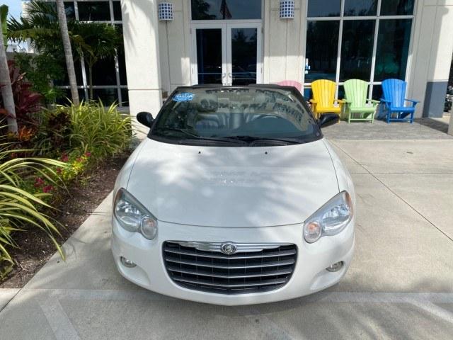 2004 Stone White /Dark Slate Gray Chrysler Sebring Limited LOW MILES 65,491 (1C3EL65R14N) with an 2.7L MPI DOHC 24-Valve V6 Engine engine, Automatic transmission, located at 4701 North Dixie Hwy, Pompano Beach, FL, 33064, (954) 422-2889, 26.240938, -80.123474 - OUR WEBPAGE FLORIDACARS1.COM HAS OVER 100 PHOTOS AND FREE CARFAX LINK 2004 Chrysler Sebring Limited Convertible 2.7L V6 F DOHC Gasoline 28 MPG Front Wheel Drive Features ABS Brakes Air Conditioning Alloy Wheels AM/FM Stereo Automatic Transmission CD Audio Cruise Control Infinity Sound System Leather- Photo#27