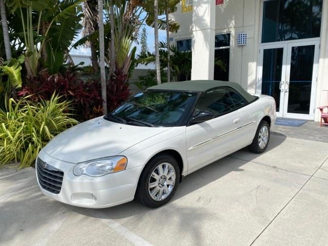 2004 Stone White /Dark Slate Gray Chrysler Sebring Limited LOW MILES 65,491 (1C3EL65R14N) with an 2.7L MPI DOHC 24-Valve V6 Engine engine, Automatic transmission, located at 4701 North Dixie Hwy, Pompano Beach, FL, 33064, (954) 422-2889, 26.240938, -80.123474 - OUR WEBPAGE FLORIDACARS1.COM HAS OVER 100 PHOTOS AND FREE CARFAX LINK 2004 Chrysler Sebring Limited Convertible 2.7L V6 F DOHC Gasoline 28 MPG Front Wheel Drive Features ABS Brakes Air Conditioning Alloy Wheels AM/FM Stereo Automatic Transmission CD Audio Cruise Control Infinity Sound System Leather- Photo#30