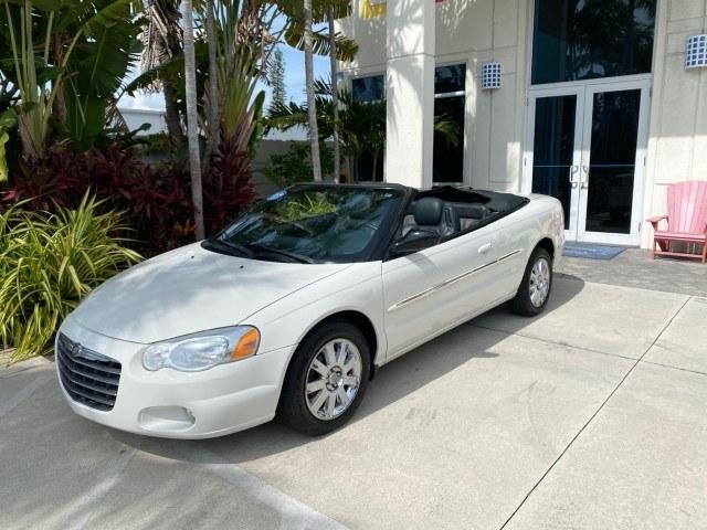 2004 Stone White /Dark Slate Gray Chrysler Sebring Limited LOW MILES 65,491 (1C3EL65R14N) with an 2.7L MPI DOHC 24-Valve V6 Engine engine, Automatic transmission, located at 4701 North Dixie Hwy, Pompano Beach, FL, 33064, (954) 422-2889, 26.240938, -80.123474 - OUR WEBPAGE FLORIDACARS1.COM HAS OVER 100 PHOTOS AND FREE CARFAX LINK 2004 Chrysler Sebring Limited Convertible 2.7L V6 F DOHC Gasoline 28 MPG Front Wheel Drive Features ABS Brakes Air Conditioning Alloy Wheels AM/FM Stereo Automatic Transmission CD Audio Cruise Control Infinity Sound System Leather- Photo#31