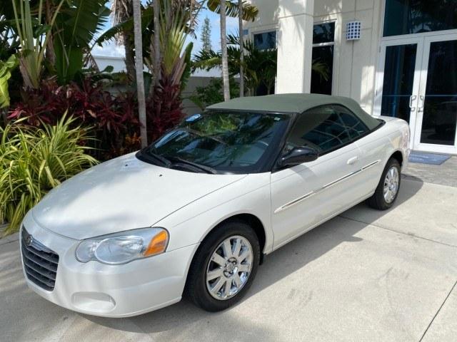 2004 Stone White /Dark Slate Gray Chrysler Sebring Limited LOW MILES 65,491 (1C3EL65R14N) with an 2.7L MPI DOHC 24-Valve V6 Engine engine, Automatic transmission, located at 4701 North Dixie Hwy, Pompano Beach, FL, 33064, (954) 422-2889, 26.240938, -80.123474 - OUR WEBPAGE FLORIDACARS1.COM HAS OVER 100 PHOTOS AND FREE CARFAX LINK 2004 Chrysler Sebring Limited Convertible 2.7L V6 F DOHC Gasoline 28 MPG Front Wheel Drive Features ABS Brakes Air Conditioning Alloy Wheels AM/FM Stereo Automatic Transmission CD Audio Cruise Control Infinity Sound System Leather- Photo#32
