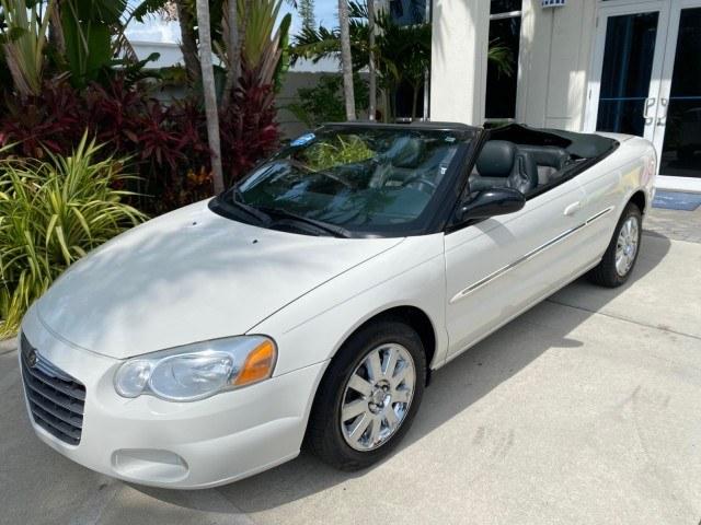 2004 Stone White /Dark Slate Gray Chrysler Sebring Limited LOW MILES 65,491 (1C3EL65R14N) with an 2.7L MPI DOHC 24-Valve V6 Engine engine, Automatic transmission, located at 4701 North Dixie Hwy, Pompano Beach, FL, 33064, (954) 422-2889, 26.240938, -80.123474 - OUR WEBPAGE FLORIDACARS1.COM HAS OVER 100 PHOTOS AND FREE CARFAX LINK 2004 Chrysler Sebring Limited Convertible 2.7L V6 F DOHC Gasoline 28 MPG Front Wheel Drive Features ABS Brakes Air Conditioning Alloy Wheels AM/FM Stereo Automatic Transmission CD Audio Cruise Control Infinity Sound System Leather- Photo#33