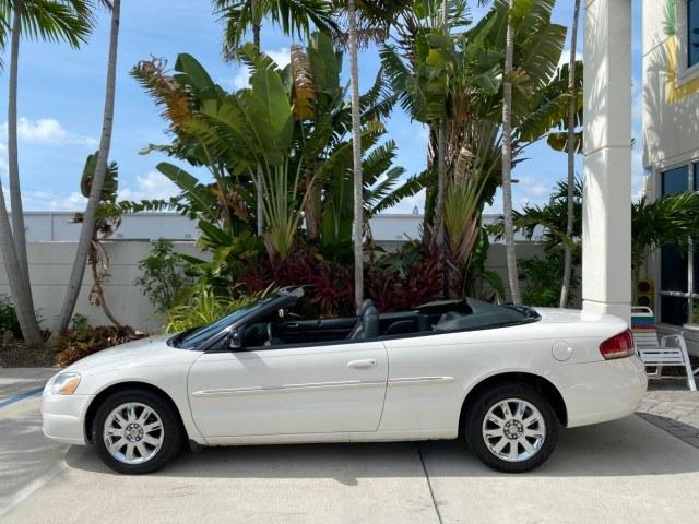 2004 Stone White /Dark Slate Gray Chrysler Sebring Limited LOW MILES 65,491 (1C3EL65R14N) with an 2.7L MPI DOHC 24-Valve V6 Engine engine, Automatic transmission, located at 4701 North Dixie Hwy, Pompano Beach, FL, 33064, (954) 422-2889, 26.240938, -80.123474 - OUR WEBPAGE FLORIDACARS1.COM HAS OVER 100 PHOTOS AND FREE CARFAX LINK 2004 Chrysler Sebring Limited Convertible 2.7L V6 F DOHC Gasoline 28 MPG Front Wheel Drive Features ABS Brakes Air Conditioning Alloy Wheels AM/FM Stereo Automatic Transmission CD Audio Cruise Control Infinity Sound System Leather- Photo#35