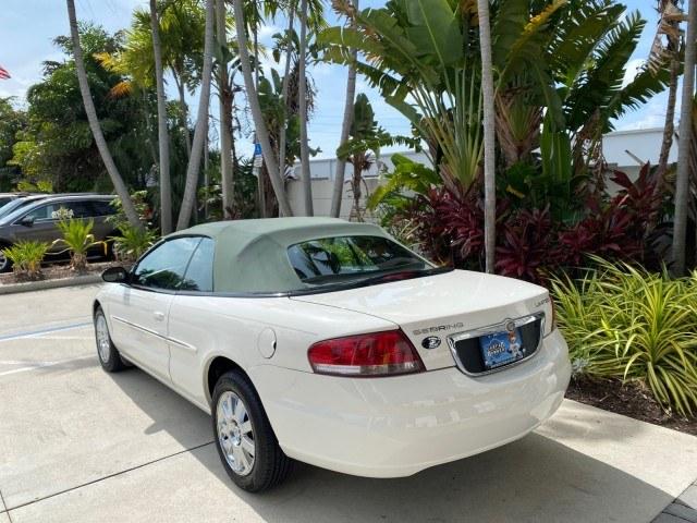 2004 Stone White /Dark Slate Gray Chrysler Sebring Limited LOW MILES 65,491 (1C3EL65R14N) with an 2.7L MPI DOHC 24-Valve V6 Engine engine, Automatic transmission, located at 4701 North Dixie Hwy, Pompano Beach, FL, 33064, (954) 422-2889, 26.240938, -80.123474 - OUR WEBPAGE FLORIDACARS1.COM HAS OVER 100 PHOTOS AND FREE CARFAX LINK 2004 Chrysler Sebring Limited Convertible 2.7L V6 F DOHC Gasoline 28 MPG Front Wheel Drive Features ABS Brakes Air Conditioning Alloy Wheels AM/FM Stereo Automatic Transmission CD Audio Cruise Control Infinity Sound System Leather- Photo#38