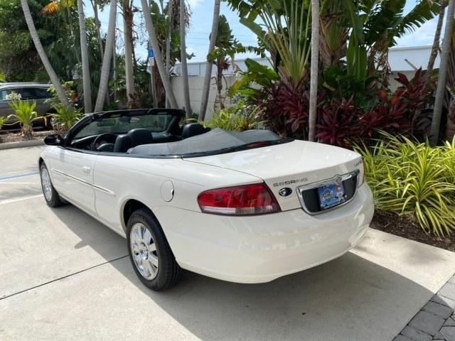 2004 Stone White /Dark Slate Gray Chrysler Sebring Limited LOW MILES 65,491 (1C3EL65R14N) with an 2.7L MPI DOHC 24-Valve V6 Engine engine, Automatic transmission, located at 4701 North Dixie Hwy, Pompano Beach, FL, 33064, (954) 422-2889, 26.240938, -80.123474 - OUR WEBPAGE FLORIDACARS1.COM HAS OVER 100 PHOTOS AND FREE CARFAX LINK 2004 Chrysler Sebring Limited Convertible 2.7L V6 F DOHC Gasoline 28 MPG Front Wheel Drive Features ABS Brakes Air Conditioning Alloy Wheels AM/FM Stereo Automatic Transmission CD Audio Cruise Control Infinity Sound System Leather- Photo#39