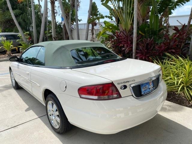 2004 Stone White /Dark Slate Gray Chrysler Sebring Limited LOW MILES 65,491 (1C3EL65R14N) with an 2.7L MPI DOHC 24-Valve V6 Engine engine, Automatic transmission, located at 4701 North Dixie Hwy, Pompano Beach, FL, 33064, (954) 422-2889, 26.240938, -80.123474 - OUR WEBPAGE FLORIDACARS1.COM HAS OVER 100 PHOTOS AND FREE CARFAX LINK 2004 Chrysler Sebring Limited Convertible 2.7L V6 F DOHC Gasoline 28 MPG Front Wheel Drive Features ABS Brakes Air Conditioning Alloy Wheels AM/FM Stereo Automatic Transmission CD Audio Cruise Control Infinity Sound System Leather- Photo#40