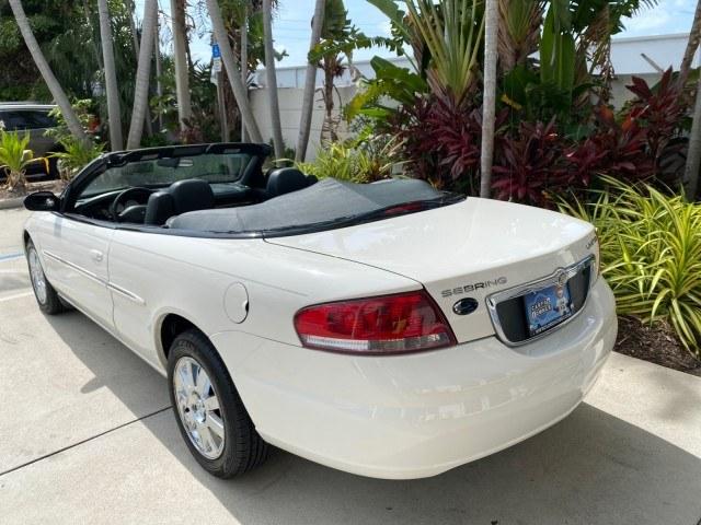 2004 Stone White /Dark Slate Gray Chrysler Sebring Limited LOW MILES 65,491 (1C3EL65R14N) with an 2.7L MPI DOHC 24-Valve V6 Engine engine, Automatic transmission, located at 4701 North Dixie Hwy, Pompano Beach, FL, 33064, (954) 422-2889, 26.240938, -80.123474 - OUR WEBPAGE FLORIDACARS1.COM HAS OVER 100 PHOTOS AND FREE CARFAX LINK 2004 Chrysler Sebring Limited Convertible 2.7L V6 F DOHC Gasoline 28 MPG Front Wheel Drive Features ABS Brakes Air Conditioning Alloy Wheels AM/FM Stereo Automatic Transmission CD Audio Cruise Control Infinity Sound System Leather- Photo#41