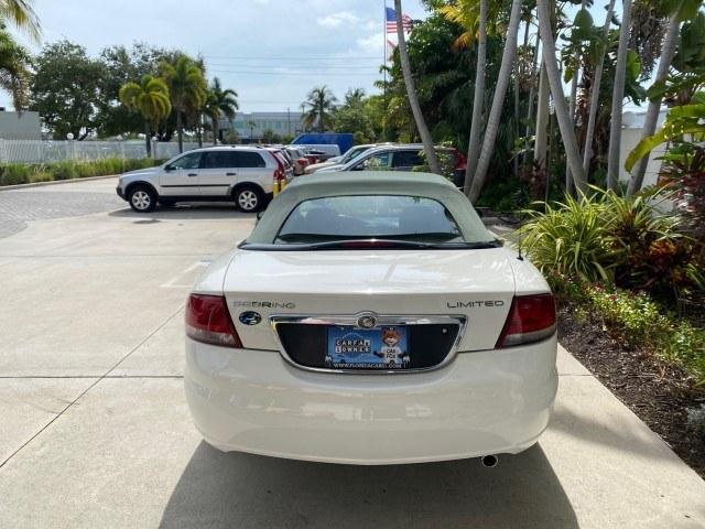 2004 Stone White /Dark Slate Gray Chrysler Sebring Limited LOW MILES 65,491 (1C3EL65R14N) with an 2.7L MPI DOHC 24-Valve V6 Engine engine, Automatic transmission, located at 4701 North Dixie Hwy, Pompano Beach, FL, 33064, (954) 422-2889, 26.240938, -80.123474 - OUR WEBPAGE FLORIDACARS1.COM HAS OVER 100 PHOTOS AND FREE CARFAX LINK 2004 Chrysler Sebring Limited Convertible 2.7L V6 F DOHC Gasoline 28 MPG Front Wheel Drive Features ABS Brakes Air Conditioning Alloy Wheels AM/FM Stereo Automatic Transmission CD Audio Cruise Control Infinity Sound System Leather- Photo#42
