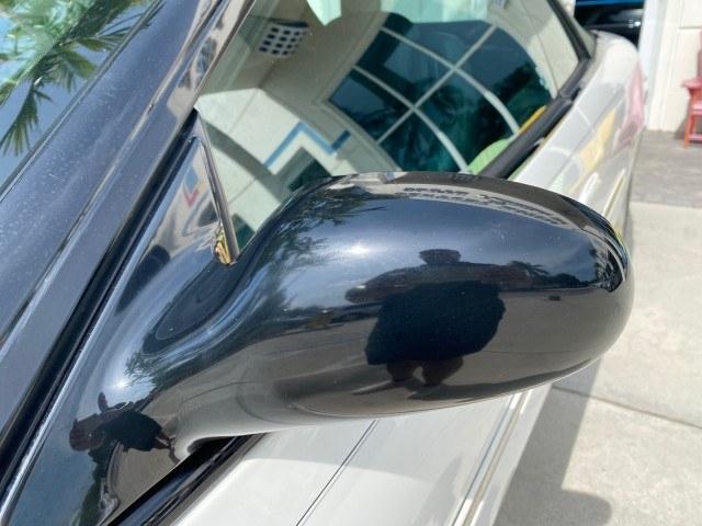 2004 Stone White /Dark Slate Gray Chrysler Sebring Limited LOW MILES 65,491 (1C3EL65R14N) with an 2.7L MPI DOHC 24-Valve V6 Engine engine, Automatic transmission, located at 4701 North Dixie Hwy, Pompano Beach, FL, 33064, (954) 422-2889, 26.240938, -80.123474 - OUR WEBPAGE FLORIDACARS1.COM HAS OVER 100 PHOTOS AND FREE CARFAX LINK 2004 Chrysler Sebring Limited Convertible 2.7L V6 F DOHC Gasoline 28 MPG Front Wheel Drive Features ABS Brakes Air Conditioning Alloy Wheels AM/FM Stereo Automatic Transmission CD Audio Cruise Control Infinity Sound System Leather- Photo#50