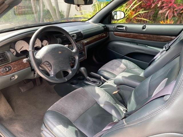 2004 Stone White /Dark Slate Gray Chrysler Sebring Limited LOW MILES 65,491 (1C3EL65R14N) with an 2.7L MPI DOHC 24-Valve V6 Engine engine, Automatic transmission, located at 4701 North Dixie Hwy, Pompano Beach, FL, 33064, (954) 422-2889, 26.240938, -80.123474 - OUR WEBPAGE FLORIDACARS1.COM HAS OVER 100 PHOTOS AND FREE CARFAX LINK 2004 Chrysler Sebring Limited Convertible 2.7L V6 F DOHC Gasoline 28 MPG Front Wheel Drive Features ABS Brakes Air Conditioning Alloy Wheels AM/FM Stereo Automatic Transmission CD Audio Cruise Control Infinity Sound System Leather- Photo#57
