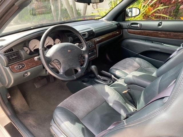2004 Stone White /Dark Slate Gray Chrysler Sebring Limited LOW MILES 65,491 (1C3EL65R14N) with an 2.7L MPI DOHC 24-Valve V6 Engine engine, Automatic transmission, located at 4701 North Dixie Hwy, Pompano Beach, FL, 33064, (954) 422-2889, 26.240938, -80.123474 - OUR WEBPAGE FLORIDACARS1.COM HAS OVER 100 PHOTOS AND FREE CARFAX LINK 2004 Chrysler Sebring Limited Convertible 2.7L V6 F DOHC Gasoline 28 MPG Front Wheel Drive Features ABS Brakes Air Conditioning Alloy Wheels AM/FM Stereo Automatic Transmission CD Audio Cruise Control Infinity Sound System Leather- Photo#58