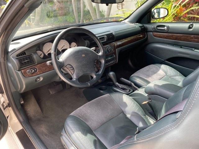 2004 Stone White /Dark Slate Gray Chrysler Sebring Limited LOW MILES 65,491 (1C3EL65R14N) with an 2.7L MPI DOHC 24-Valve V6 Engine engine, Automatic transmission, located at 4701 North Dixie Hwy, Pompano Beach, FL, 33064, (954) 422-2889, 26.240938, -80.123474 - OUR WEBPAGE FLORIDACARS1.COM HAS OVER 100 PHOTOS AND FREE CARFAX LINK 2004 Chrysler Sebring Limited Convertible 2.7L V6 F DOHC Gasoline 28 MPG Front Wheel Drive Features ABS Brakes Air Conditioning Alloy Wheels AM/FM Stereo Automatic Transmission CD Audio Cruise Control Infinity Sound System Leather- Photo#59