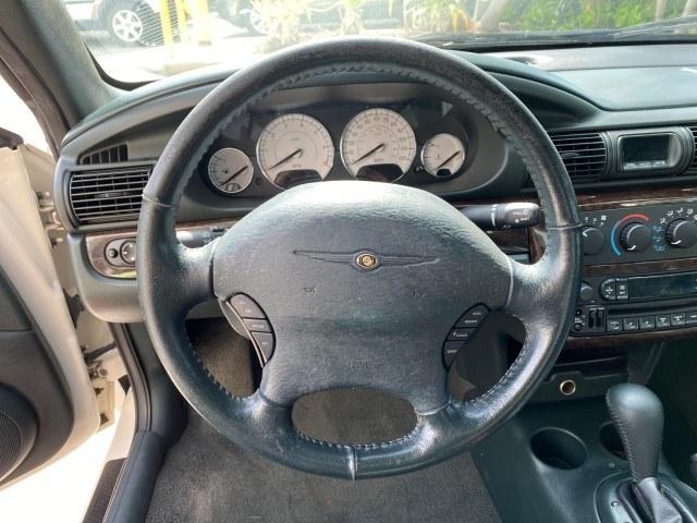 2004 Stone White /Dark Slate Gray Chrysler Sebring Limited LOW MILES 65,491 (1C3EL65R14N) with an 2.7L MPI DOHC 24-Valve V6 Engine engine, Automatic transmission, located at 4701 North Dixie Hwy, Pompano Beach, FL, 33064, (954) 422-2889, 26.240938, -80.123474 - OUR WEBPAGE FLORIDACARS1.COM HAS OVER 100 PHOTOS AND FREE CARFAX LINK 2004 Chrysler Sebring Limited Convertible 2.7L V6 F DOHC Gasoline 28 MPG Front Wheel Drive Features ABS Brakes Air Conditioning Alloy Wheels AM/FM Stereo Automatic Transmission CD Audio Cruise Control Infinity Sound System Leather- Photo#60