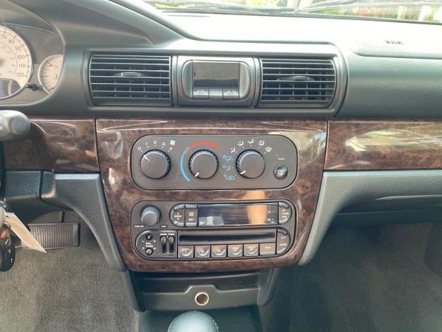 2004 Stone White /Dark Slate Gray Chrysler Sebring Limited LOW MILES 65,491 (1C3EL65R14N) with an 2.7L MPI DOHC 24-Valve V6 Engine engine, Automatic transmission, located at 4701 North Dixie Hwy, Pompano Beach, FL, 33064, (954) 422-2889, 26.240938, -80.123474 - OUR WEBPAGE FLORIDACARS1.COM HAS OVER 100 PHOTOS AND FREE CARFAX LINK 2004 Chrysler Sebring Limited Convertible 2.7L V6 F DOHC Gasoline 28 MPG Front Wheel Drive Features ABS Brakes Air Conditioning Alloy Wheels AM/FM Stereo Automatic Transmission CD Audio Cruise Control Infinity Sound System Leather- Photo#69