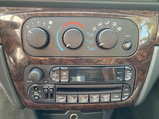 2004 Stone White /Dark Slate Gray Chrysler Sebring Limited LOW MILES 65,491 (1C3EL65R14N) with an 2.7L MPI DOHC 24-Valve V6 Engine engine, Automatic transmission, located at 4701 North Dixie Hwy, Pompano Beach, FL, 33064, (954) 422-2889, 26.240938, -80.123474 - OUR WEBPAGE FLORIDACARS1.COM HAS OVER 100 PHOTOS AND FREE CARFAX LINK 2004 Chrysler Sebring Limited Convertible 2.7L V6 F DOHC Gasoline 28 MPG Front Wheel Drive Features ABS Brakes Air Conditioning Alloy Wheels AM/FM Stereo Automatic Transmission CD Audio Cruise Control Infinity Sound System Leather- Photo#71