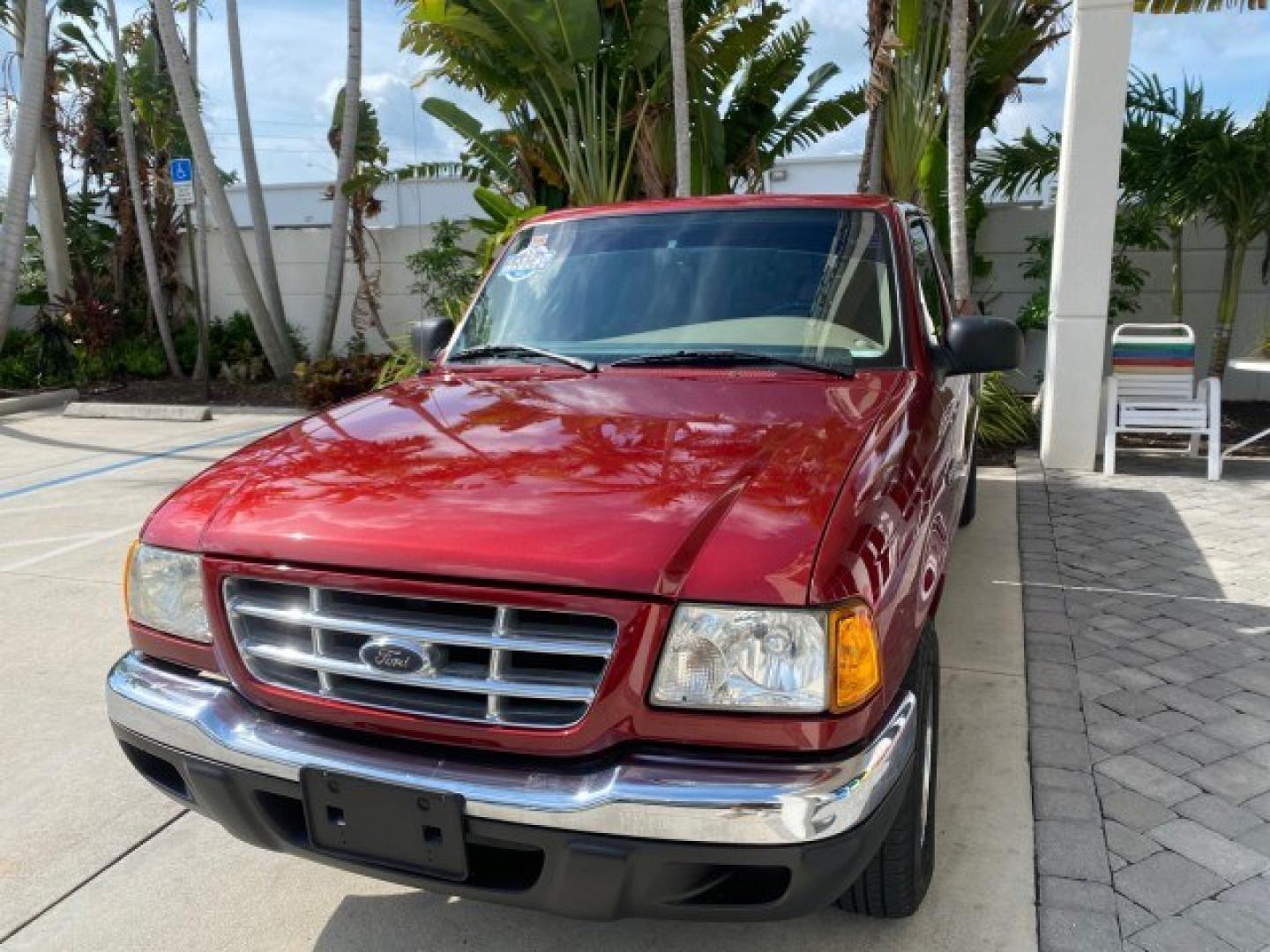 2002 Toreador Red Metallic /Med Prairie Tan Ford Ranger XLT LOW MILES 58,532 1 OWNER (1FTYR44V42P) with an 3.0L SEFI V6 Engine engine, Automatic transmission, located at 4701 North Dixie Hwy, Pompano Beach, FL, 33064, (954) 422-2889, 26.240938, -80.123474 - OUR WEBPAGE FLORIDACARS1.COM HAS OVER 100 PHOTOS AND FREE CARFAX LINK 2002 Ford Ranger XLT 1 OWNER 4 Door Extended Cab Pickup 3.0L V6 F Flex Fuel 22 MPG Rear Wheel Drive Features ABS Brakes Air Conditioning AM/FM Stereo Automatic Transmission CD Audio Cloth Seats Cruise Control Power Locks Power Mir- Photo#3