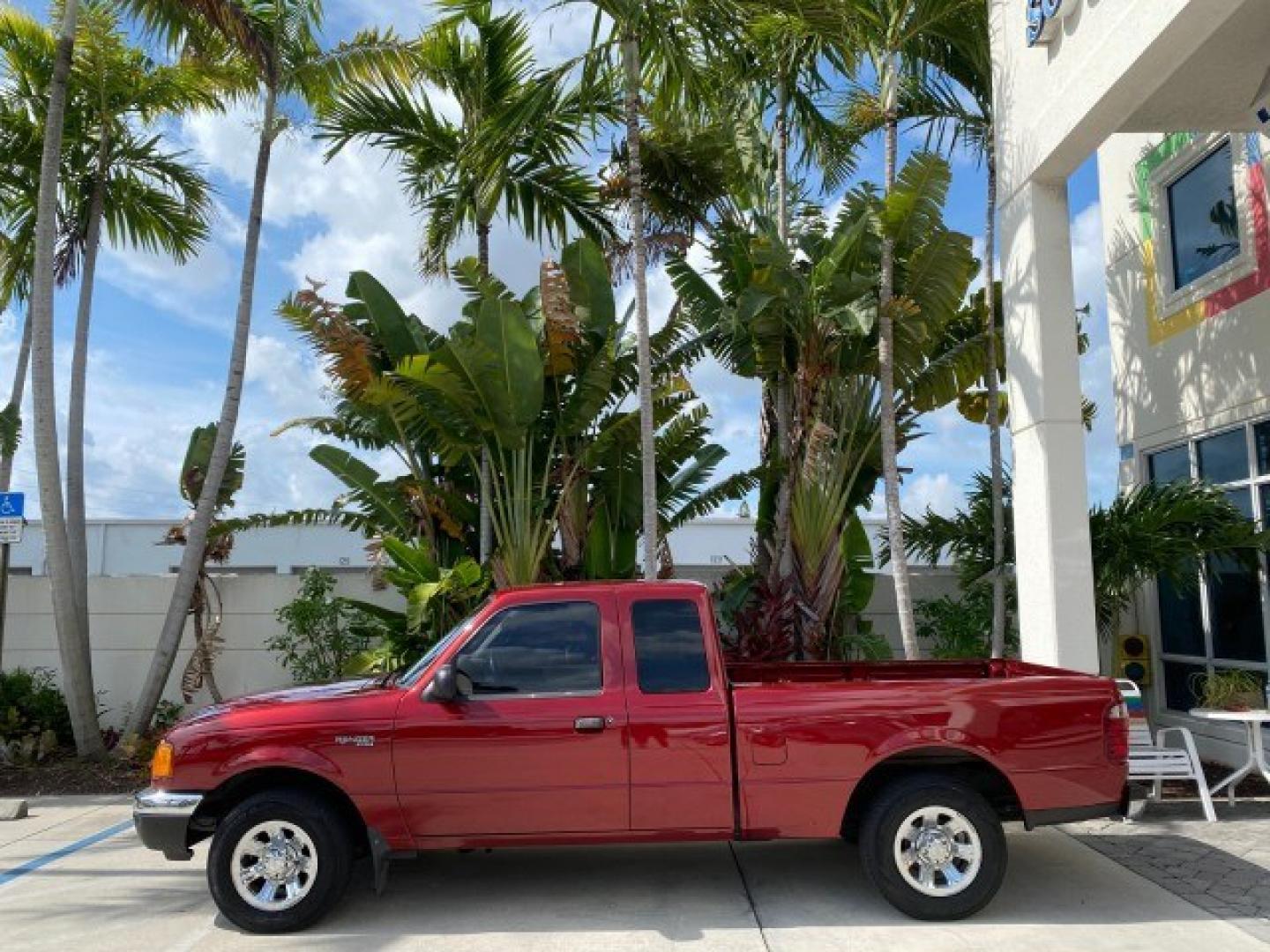 2002 Toreador Red Metallic /Med Prairie Tan Ford Ranger XLT LOW MILES 58,532 1 OWNER (1FTYR44V42P) with an 3.0L SEFI V6 Engine engine, Automatic transmission, located at 4701 North Dixie Hwy, Pompano Beach, FL, 33064, (954) 422-2889, 26.240938, -80.123474 - OUR WEBPAGE FLORIDACARS1.COM HAS OVER 100 PHOTOS AND FREE CARFAX LINK 2002 Ford Ranger XLT 1 OWNER 4 Door Extended Cab Pickup 3.0L V6 F Flex Fuel 22 MPG Rear Wheel Drive Features ABS Brakes Air Conditioning AM/FM Stereo Automatic Transmission CD Audio Cloth Seats Cruise Control Power Locks Power Mir- Photo#4
