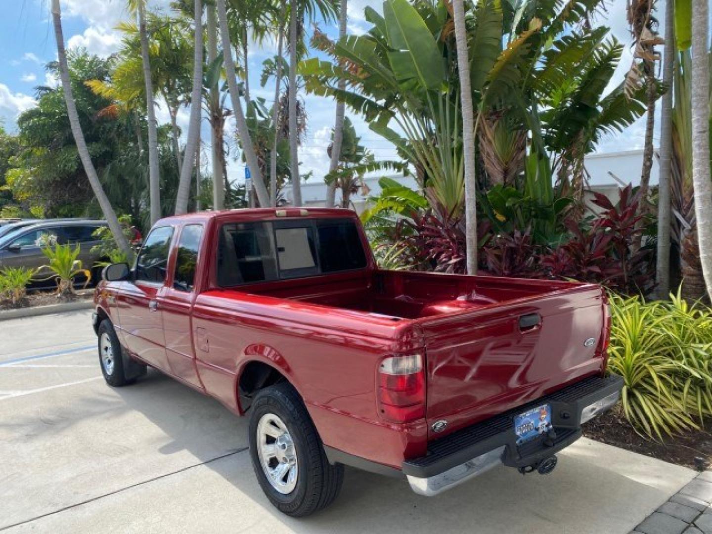 2002 Toreador Red Metallic /Med Prairie Tan Ford Ranger XLT LOW MILES 58,532 1 OWNER (1FTYR44V42P) with an 3.0L SEFI V6 Engine engine, Automatic transmission, located at 4701 North Dixie Hwy, Pompano Beach, FL, 33064, (954) 422-2889, 26.240938, -80.123474 - OUR WEBPAGE FLORIDACARS1.COM HAS OVER 100 PHOTOS AND FREE CARFAX LINK 2002 Ford Ranger XLT 1 OWNER 4 Door Extended Cab Pickup 3.0L V6 F Flex Fuel 22 MPG Rear Wheel Drive Features ABS Brakes Air Conditioning AM/FM Stereo Automatic Transmission CD Audio Cloth Seats Cruise Control Power Locks Power Mir- Photo#5