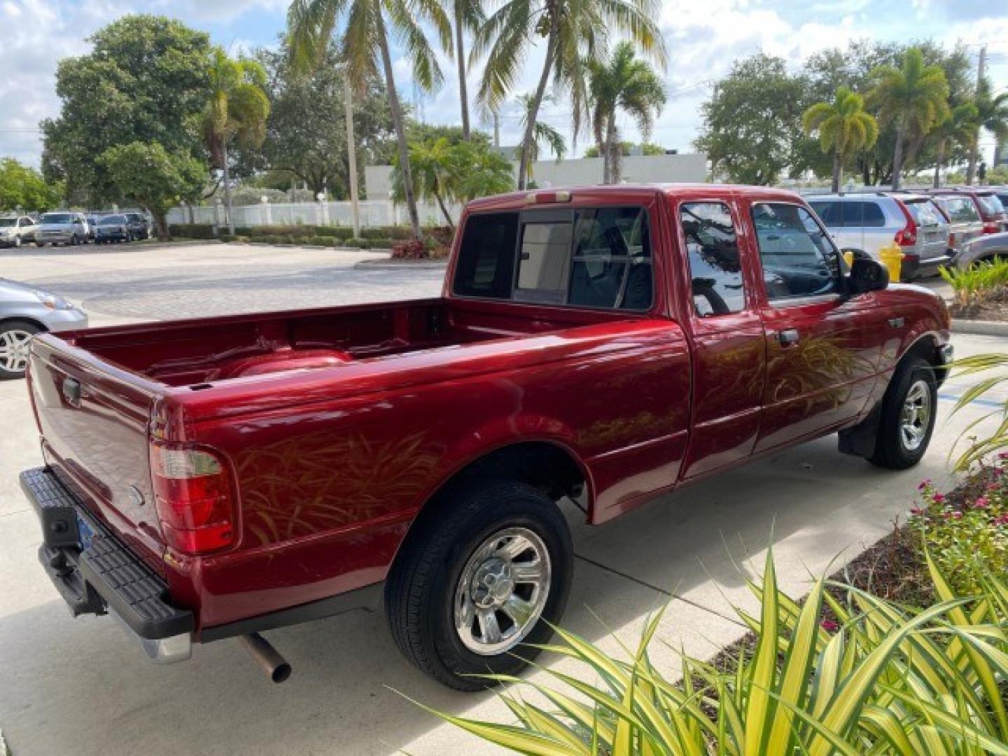 2002 Toreador Red Metallic /Med Prairie Tan Ford Ranger XLT LOW MILES 58,532 1 OWNER (1FTYR44V42P) with an 3.0L SEFI V6 Engine engine, Automatic transmission, located at 4701 North Dixie Hwy, Pompano Beach, FL, 33064, (954) 422-2889, 26.240938, -80.123474 - OUR WEBPAGE FLORIDACARS1.COM HAS OVER 100 PHOTOS AND FREE CARFAX LINK 2002 Ford Ranger XLT 1 OWNER 4 Door Extended Cab Pickup 3.0L V6 F Flex Fuel 22 MPG Rear Wheel Drive Features ABS Brakes Air Conditioning AM/FM Stereo Automatic Transmission CD Audio Cloth Seats Cruise Control Power Locks Power Mir- Photo#7